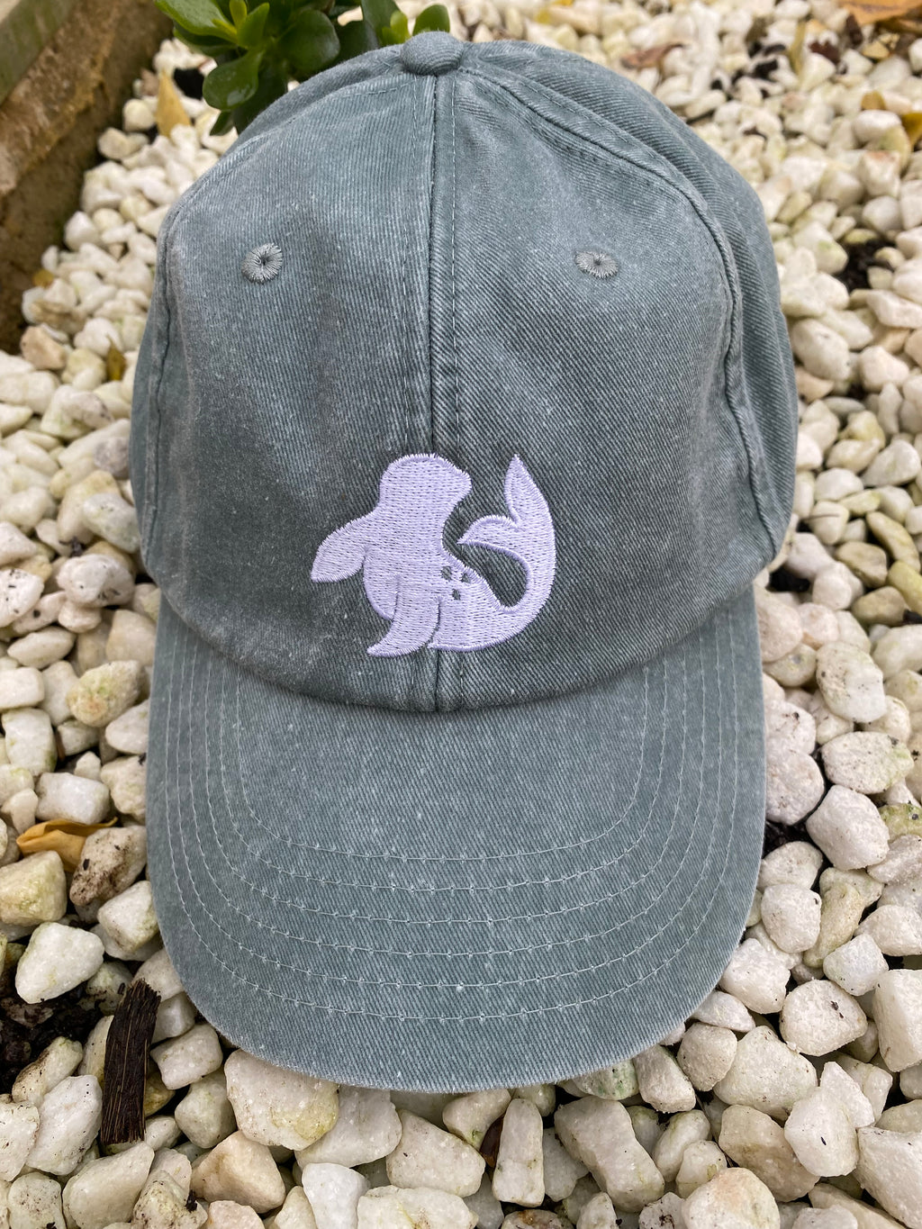 spotted-seal unisex cap in green Samphire  with embroidered seal
